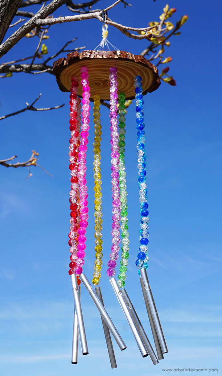 wood slice wind chime made from beads.